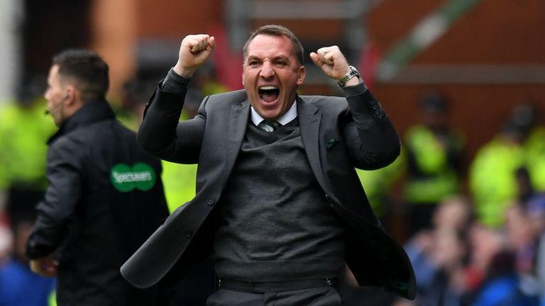 Celtic manager Brendan Rodgers celebrates his side's first goal against Rangers
