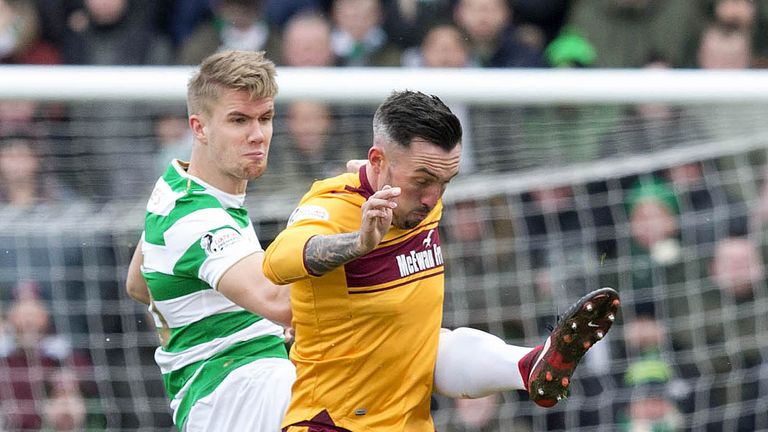 Celtic's Kristoffer Ajer and Motherwellss Ryan Bowman battle for the ball during the Ladbrokes Scottish Premiership match at Fir Park, Motherwell. PRESS ASSOCIATION Photo. Picture date: Sunday March 18, 2018. See PA story SOCCER Motherwell. Photo credit should read: Jeff Holmes/PA Wire. EDITORIAL USE ONLY