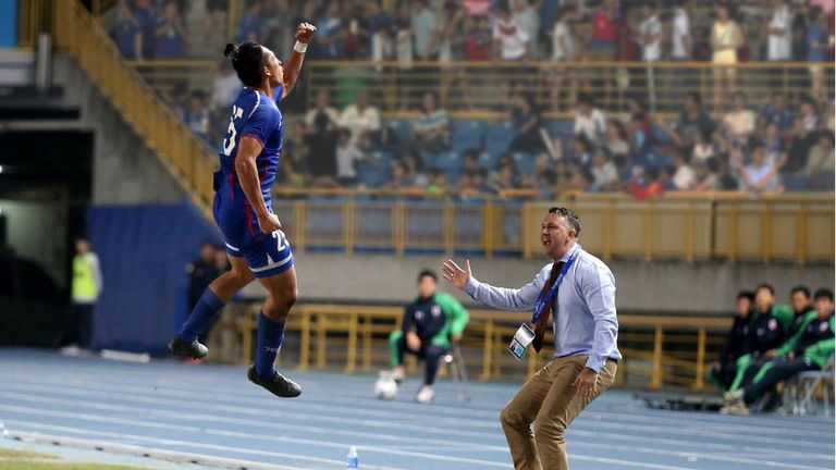 Chinese Taipei coach Gary White celebrates with his players [Credit: CTFA]