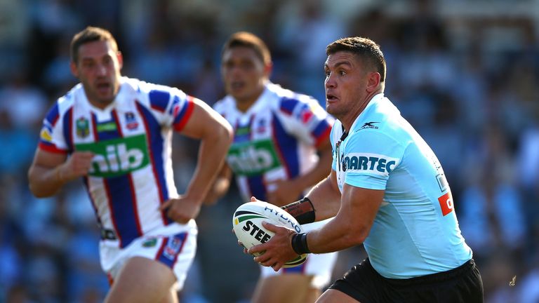 Chris Heighington looks to run the ball for the Newcastle Knights
