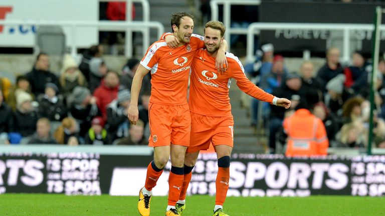 Danny Hylton and Andrew Shinnie during the The Emirates FA Cup Third Round match between Newcastle United and Luton Town at St James' Park on January 6, 2018 in Newcastle upon Tyne, England.
