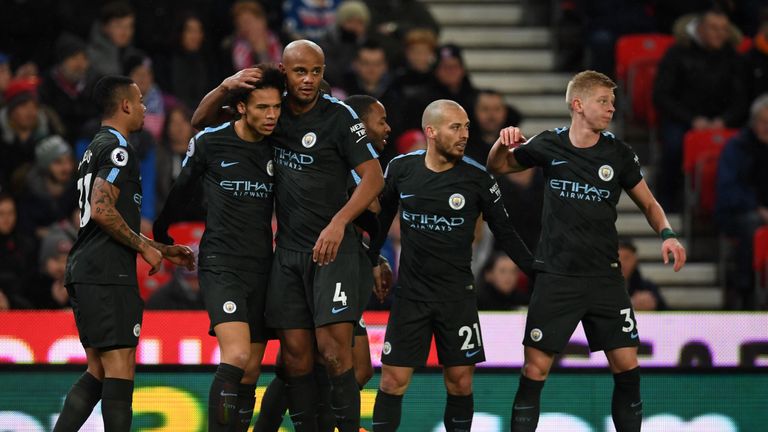 Man City celebrate a goal against Stoke