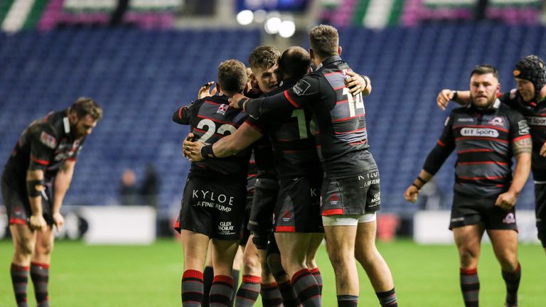 Edinburgh players celebrate at the final whistle at BT Murrayfield 