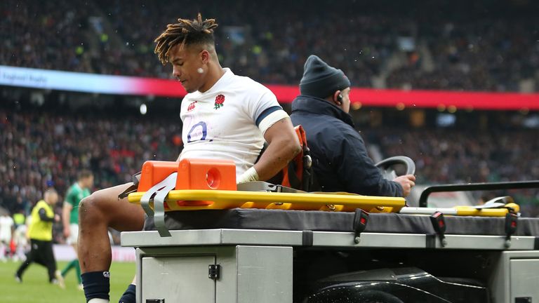 England's Anthony Watson goes off injured during the NatWest Six Nations match against Ireland