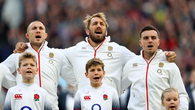 Mike Brown, Chris Robshaw and George Ford sing the national anthem 