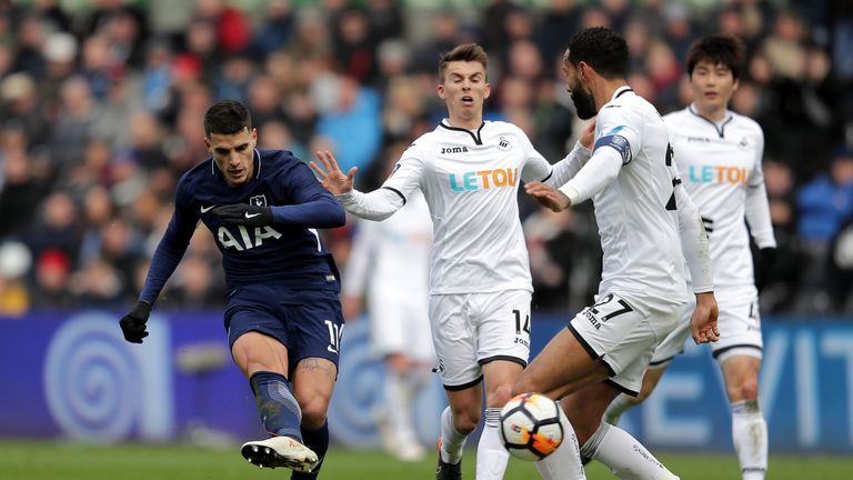 Erik Lamela curled home Tottenham's second against Swansea