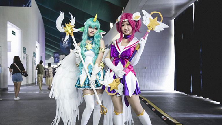 Two cosplayers at the 2017 World Championship dressing up as game characters Soraka and Lux. Soraka was considered highly 'meta', while Lux is barely played at all on the professional level (credit: Riot Games)