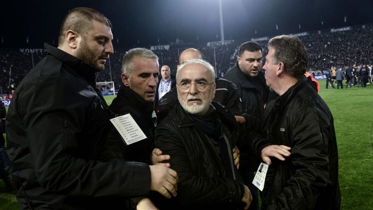 Paok president Ivan Savvidis takes to the pitch carrying a handgun in his waistband  after the referee refused a last minute goal  vs AEK Athens 