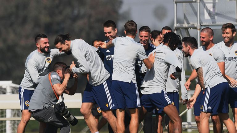 Ibrahimovic is welcomed by his new team-mates during his first LA Galaxy training session