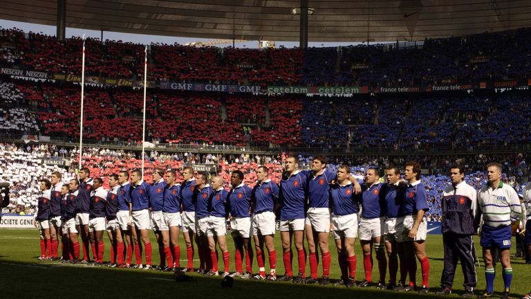 France's players sing their national anthem before their 2002 Grand Slam winning match at the Stade de France