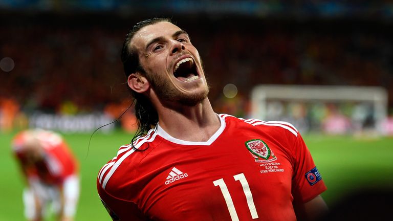 Gareth Bale celebrates his team's 3-1 win after the UEFA EURO 2016 quarter final match between Wales and Belgium at Stade Pierre-Mauroy on July 1, 2016
