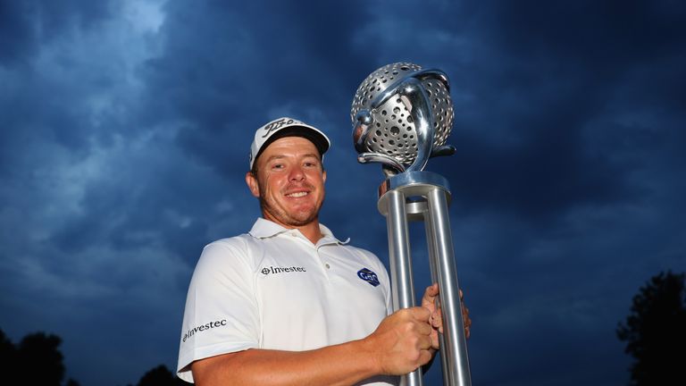 George Coetzee proudly displays the trophy after winning the Tshwane Open 