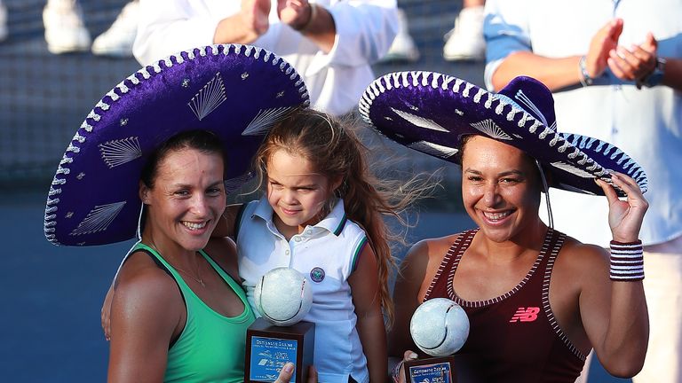 Heather Watson (R) and Tatjana Maria (L) after winning the women's doubles at the Acapulco Open in Mexico