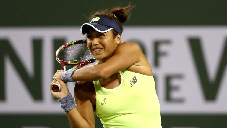 Heather Watson of Great Britain returns a shot to Victoria Azarenka of Belarus during the BNP Paribas Open at the Indian Wells Tennis Garden on March 8, 2018 in Indian Wells, California