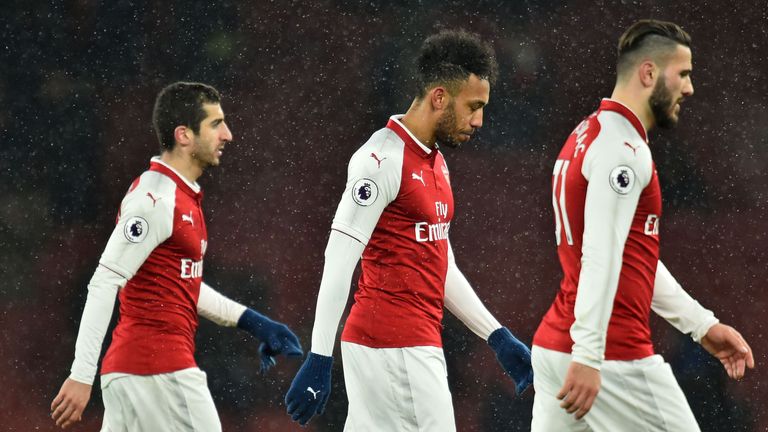 Henrikh Mkhitaryan, Pierre-Emerick Aubameyang and Sead Kolasinac leave the pitch after the 3-0 Premier League defeat to Manchester City