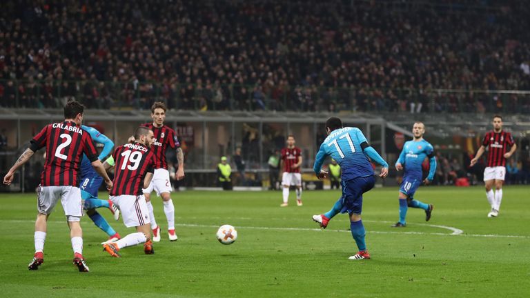 MILAN, ITALY - MARCH 08: Henrikh Mkhitaryan of Arsenal scores during the UEFA Europa League Round of 16 match between AC Milan and Arsenal at the San Siro on March 8, 2018 in Milan, Italy. (Photo by Catherine Ivill/Getty Images)