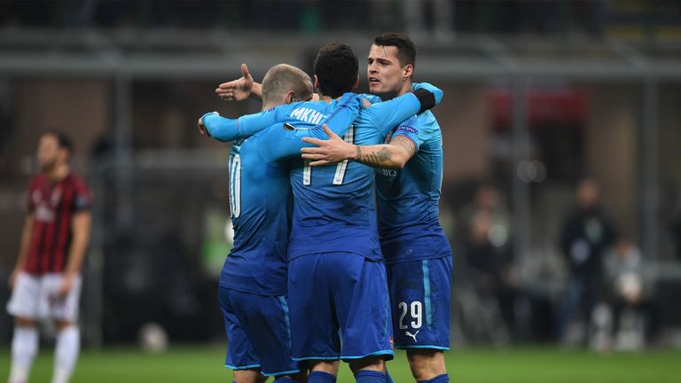 MILAN, ITALY - MARCH 08: Henrikh Mkhitaryan celebrates scoring Arsenal's 1st goal with Jack Wilhsere and Granit Xhaka during UEFA Europa League Round of 16 match between AC Milan and Arsenal at the San Siro on March 8, 2018 in Milan, Italy. (Photo by David Price/Arsenal FC via Getty Images)