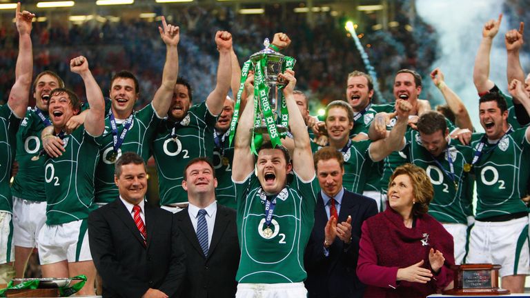 Brian O'Driscoll of Ireland lifts the trophy after Ireland won the Grand Slam as Prince William looks on in Cardiff, Wales on March 21, 2009