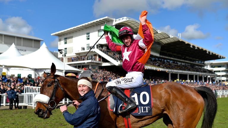 Jack Kennedy riding Shattered Love celebrates victory in the JLT Novices Chase