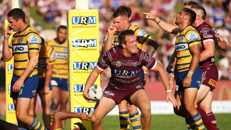 Jake Trbojevic of the Sea Eagles celebrates scoring a try against the Parramatta Eels 