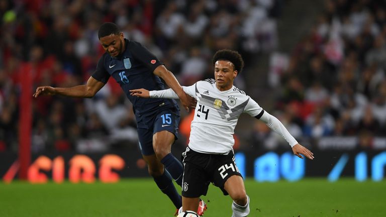 Joe Gomez and Leroy Sane tussle during the International friendly match between England and Germany at Wembley Stadium on November 10, 2017 in London, England.