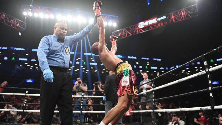 Boxer Jose Uzcategui of Mexico celebrates defeating Andre Dirrell of the US in their interim IBF Super Middleweight bout in New York, on March 3, 2018. / AFP PHOTO / Timothy A. CLARY        (Photo credit should read TIMOTHY A. CLARY/AFP/Getty Images)