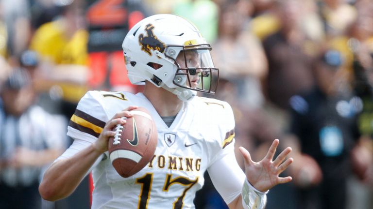 IOWA CITY, IOWA- SEPTEMBER 2:  Quarterback Josh Allen #17 of the Wyoming Cowboys looks for a receiver in the third quarter against the Iowa Hawkeyes, on September 2, 2017 at Kinnick Stadium in Iowa City, Iowa.  (Photo by Matthew Holst/Getty Images) *** Local Caption *** Josh Allen