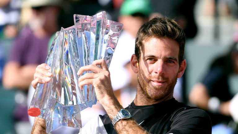 Juan Martin del Potro of Argentina poses with the trophy after his victory over Roger Federer of Switzerland in the ATP final during the BNP Paribas Open at the Indian Wells Tennis Garden on March 18, 2018 in Indian Wells, California