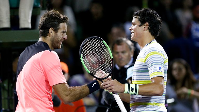 Juan Martin del Potro of Argentina shakes hands with Milos Raonic of Canada after their quarterfinal match on Day 10 of the Miami Open Presented by Itau at Crandon Park Tennis Center on March 28, 2018 in Key Biscayne, Florida