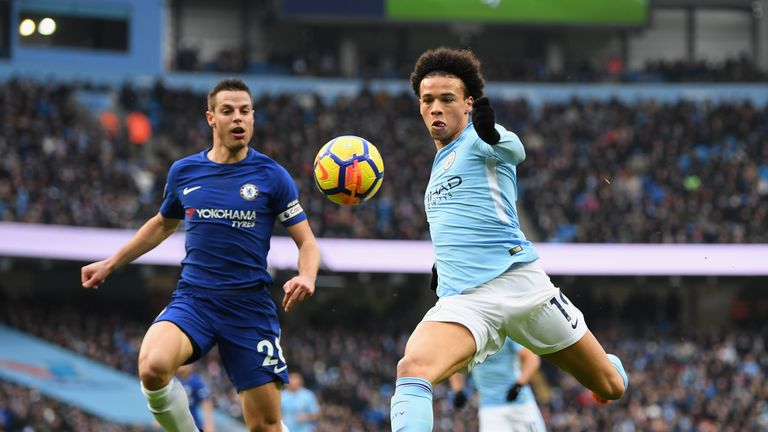 Leroy Sane and Cesar Azpilicueta in action during the Premier League match between Manchester City and Chelsea