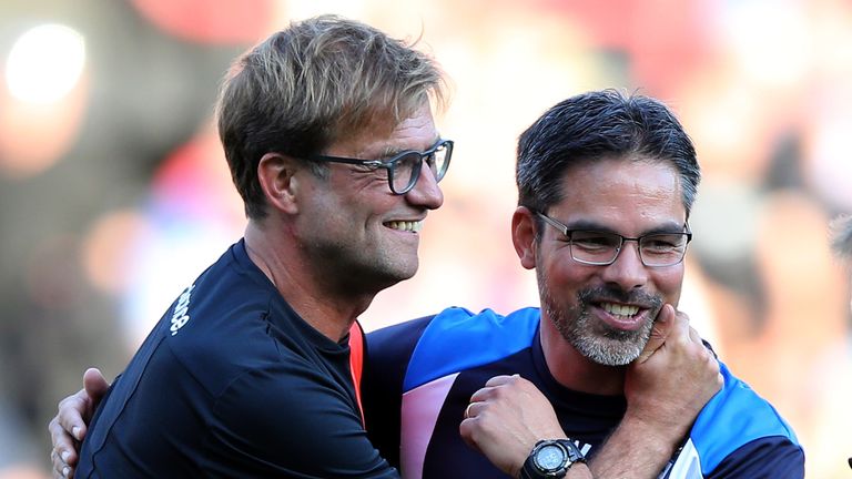 Liverpool manager Jurgen Klopp embraces best friend David Wagner of Huddersfield