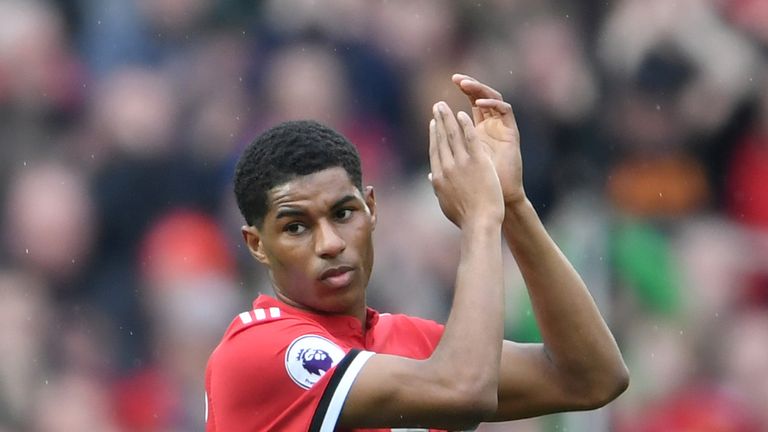 Marcus Rashford claps the Manchester United fans after victory over Liverpool