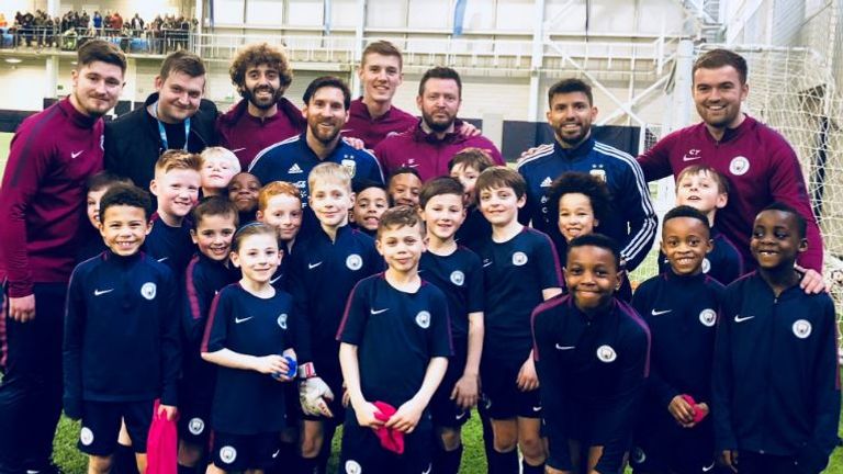 Lionel Messi and Sergio Aguero  delight kids at the Manchester City Academy (photo: Manchester City)
