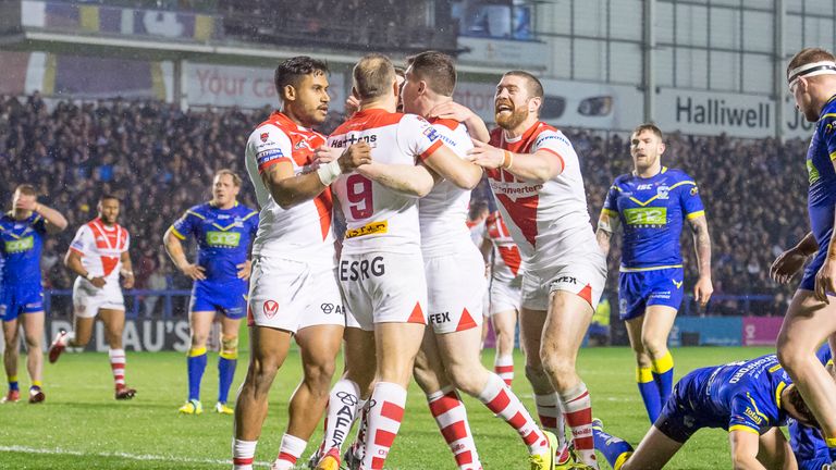 St Helens celebrate one of Mark Percival's three tries against Warrington