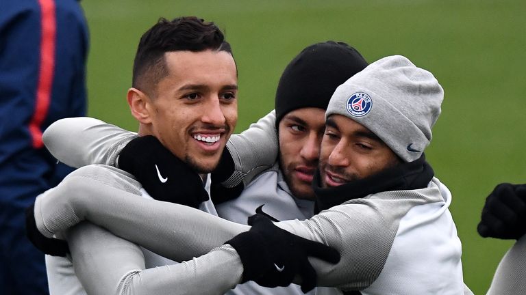 Marquinhos (left) wants  Neymar (centre) to stay in the French capital
