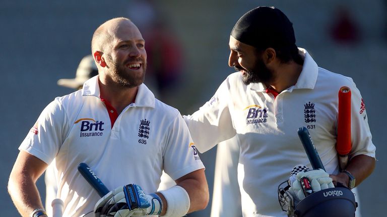 Matt Prior and Monty Panesar celebrate after securing a draw in the 2013 Eden Park Test