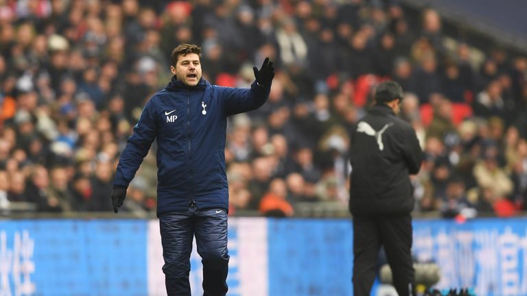 Mauricio Pochettino gives his Tottenham side instructions during the Premier League match against Huddersfield Town at Wembley Stadium