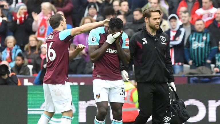 West Ham's Michail Antonio leaves the pitch with his head in his hands after picking up an injury during the Premier League match against Southampton