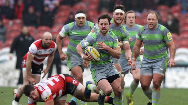 Mickey Young, who scored one of Newcastle's tries, on the charge against Gloucester