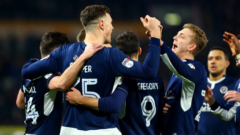 HULL, ENGLAND - MARCH 06: Millwall players celebrate their second goal scored by Jake Cooper during the Sky Bet Championship match between Hull City and Millwall FC at KCOM Stadium on March 6, 2018 in Hull, England. (Photo by Ashley Allen/Getty Images)
