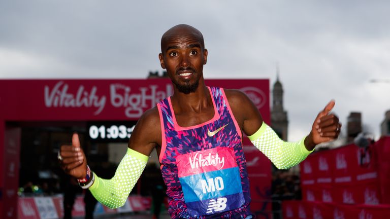 Mo Farah celebrates winning the Vitality Big Half in London City Centre