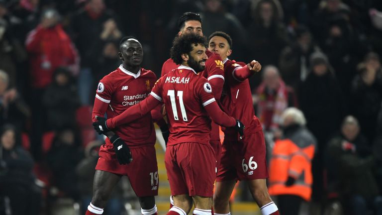 Sadio Mane is congratulated by team-mates after scoring Liverpool's second against Newcastle