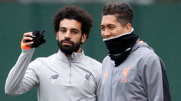 Liverpool's Mohamed Salah and Roberto Firmino during a training session at Melwood ahead of their UEFA Champions League Round of 16 match with FC Porto