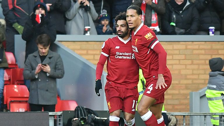Mohamed Salah celebrates with Virgil van Dijk after scoring Liverpool's first goal v Watford during the Premier League match at Anfield, Liverpool. PRESS ASSOCIATION Photo. Picture date: Saturday March 17, 2018. See PA story SOCCER Liverpool. Photo credit should read: Anthony Devlin/PA Wire.