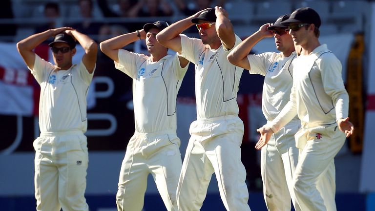New Zealand's slip cordon display their frustration as Panesar and Prior see out the overs