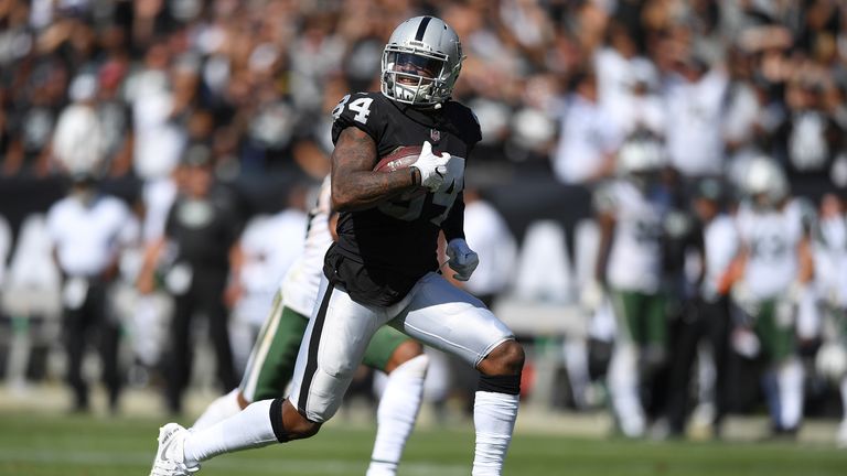 Cordarrelle Patterson #84 of the Oakland Raiders scores on a 43 yard touchdown run against the New York Jets