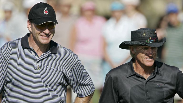 Nick Faldo (L) and Greg Norman during the first round of the Merrill Lynch Shootout at the Tiburon Golf Club in Naples, Florida on November 10, 2006.