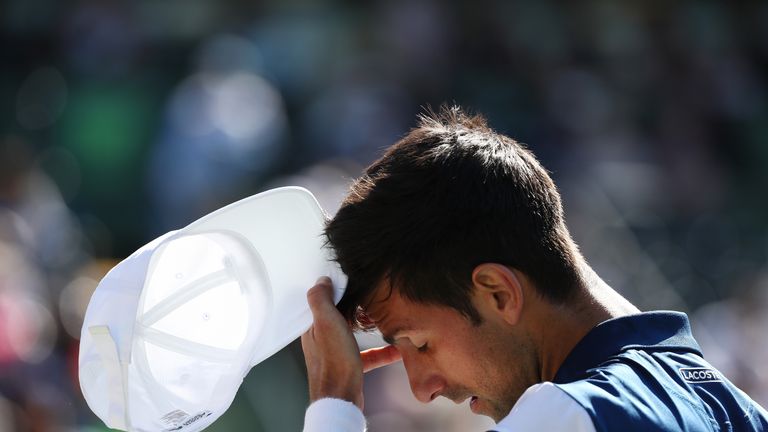 Novak Djokovic of Serbia reacts to a lost point against Benoit Paire of France during Day 5 of the Miami Open at the Crandon Park Tennis Center on March 23, 2018 in Key Biscayne, Florida