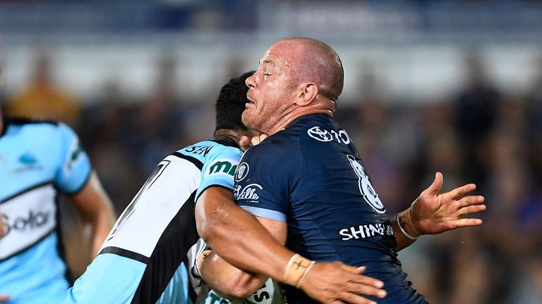 Matt Scott on the attack for the Cowboys against the Cronulla Sharks in Round 1 of the NRL