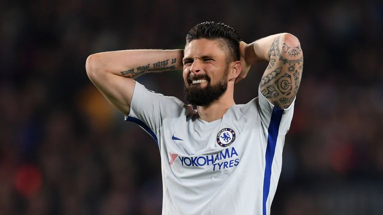 Olivier Giroud reacts during the 3-0 Champions League Round of 16, Second Leg loss to Barcelona at Camp Nou on March 14, 2018